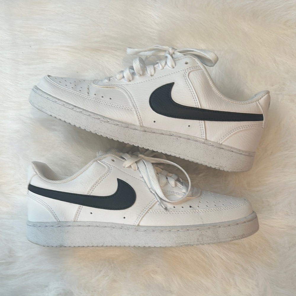 Nike White Sneakers with Black Swoosh
